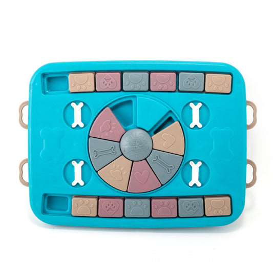 Blue Interactive Dog Puzzle Feeder - Top View Showing Rotating Wheel, Sliding Panels, and Bone-Shaped Handles
