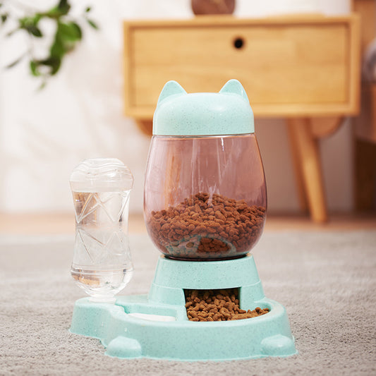 Green Automatic Pet Feeder in Home Setting - Cat Ear Design with Food and Water Dispensers, Cozy Interior Background