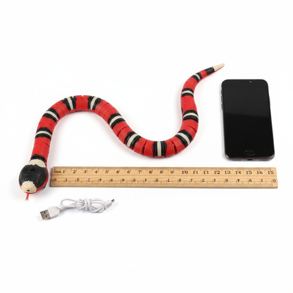  "Robotic Snake Toy Size Comparison - Actual Length with Phone and Ruler Reference"